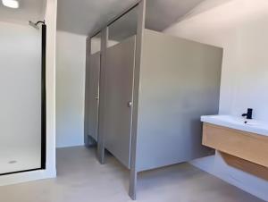 a bathroom with a sink and a mirror at Rare Mirrored Glamping Dome in Severn