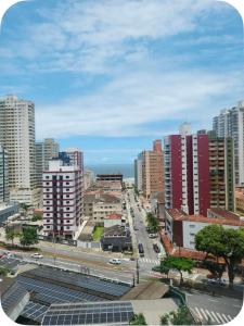 a view of a city with buildings and a street at Apto Novo no Canto do Forte PG in Praia Grande