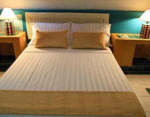 Letto o letti in una camera di Hotel Guadaira Resort
