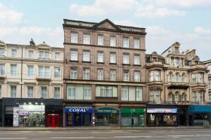 a large building on the corner of a street at Four Points Flex by Sheraton Edinburgh in Edinburgh