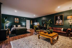 a bedroom with a bed and a living room at Istana Lodge in Musk Vale +53 photos
