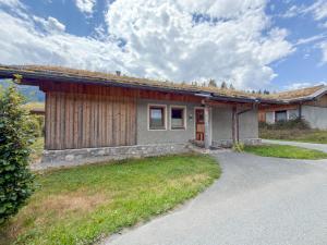 a house with a pathway leading to it at Bellone 52 in Lake Pressegg