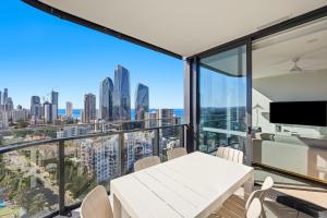a dining room with a view of the city at Amaya in Gold Coast