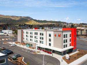 an aerial view of a building in a city at avid hotel Wenatchee by IHG in Wenatchee