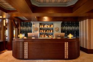 a restaurant with a counter with two laptops on it at Faraway Jackson Hole in Teton Village