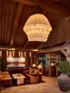 a large chandelier hanging from the ceiling in a room at Faraway Jackson Hole in Teton Village