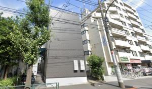 a building on a street in front of a building at SCREEN Shibamata 20 mins to Skytree in Tokyo