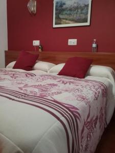 Posteľ alebo postele v izbe v ubytovaní Hostal Campus