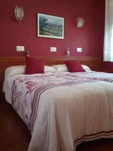Posteľ alebo postele v izbe v ubytovaní Hostal Campus