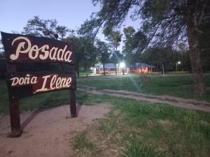 a sign for a potato tower in a park at Posada doña ilene in Quimilí