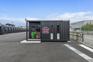 a small building on the side of a road at HOTEL R9 The Yard Nikkoimaichi in Imaichi