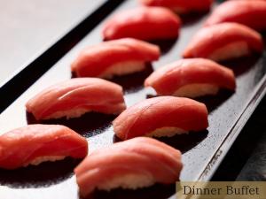 a tray filled with red and white sushi at The HOTEL SANRAKU KANAZAWA in Kanazawa