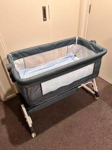 a hospital bed sitting in a room at warm, quiet and convenient ! in Auckland +24 photos