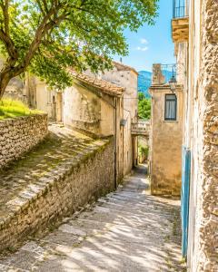 an alley in an old town in italy at Bella Maratea in Maratea