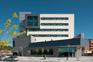 a building with people standing in front of it at Sercotel Hola Tafalla in Tafalla +85 photos