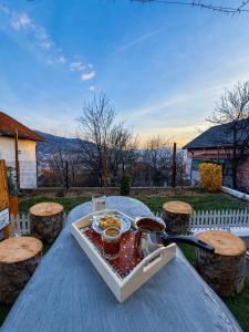 a picnic table with a tray of food on it at Apartment Benjo in Sarajevo