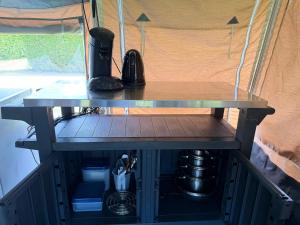 a table in the back of a tent at Glamping in Style in Dronrijp +19 photos