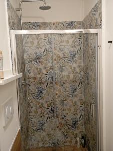 a shower in a bathroom with a shower curtain at Borgo Mantova in Potenza
