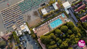 an overhead view of a building with a swimming pool at Pantera Rosa Village in Scalea