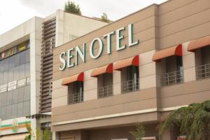 a sign on the side of a sentinel building at Sen Otel in Sakarya