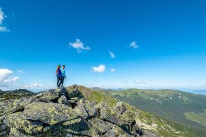 a couple standing on top of a mountain at Chalets Jasná Collection Centrum in Belá +36 photos