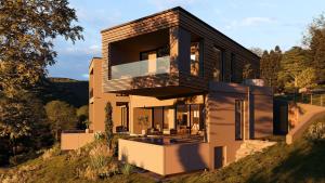 a house on the side of a hill at Cubea in Bodenmais +14 photos