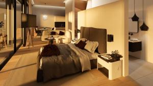 a bedroom with a bed and a living room at Cubea in Bodenmais