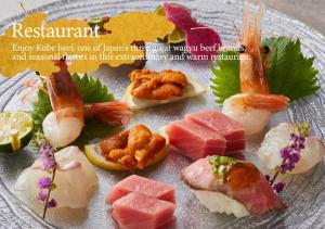 a plate of different types of food on a plate at KAMENOI HOTEL Arima in Kobe
