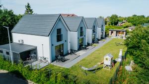 an aerial view of a house with a yard at Baltic Breeze & Spa in Władysławowo
