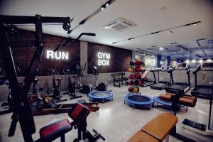 a gym with a bunch of exercise equipment in it at Velipoja Grand Europa Resort, Affiliated by Meliá in Velipojë +48 photos