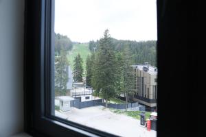 a view of a city from a window at SKYHILL 1 O1 Jahorna in Jahorina