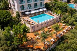 an aerial view of a hotel with a swimming pool at Suna Sun Hotel - Adult Only in Kaş +16 photos