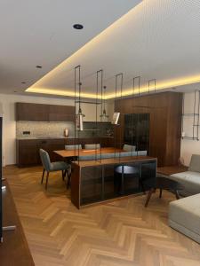 a living room with a table and a couch at Dolce Vita Appartment in Schärding