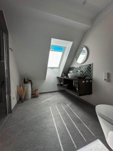 a white room with a sink and a window at LUMEA Devin in Stralsund +16 photos