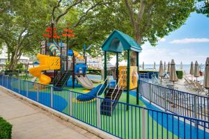 a playground in a park with a slide at Marina Hotel, Sunny Day in Saints Constantine and Helena