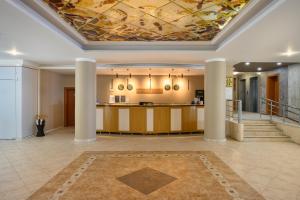 a lobby with a ceiling with a painting on it at Marina Hotel, Sunny Day in Saints Constantine and Helena +32 photos