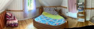 a bedroom with a bed in a small room at Siedlisko Urszulanka Dom in Policzna +10 photos