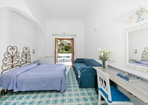 Postel nebo postele na pokoji v ubytování Hotel Vittoria + 36 fotografií