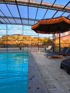 a swimming pool with a view of a mountain at Cascade Resort Sevan in Sevan