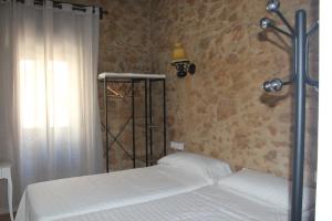 a bedroom with a bed in a room at Lotel Casa Noble in Valencia
