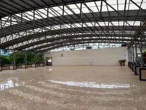 a large building with a large open ceiling at Sakkhar Palace in Indore