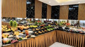 a buffet line with many different types of food at Grand Gülizar Otel in Urfa