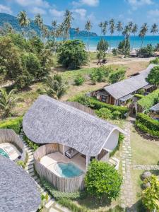 an aerial view of a resort with a pool at Rest Sea Resort Koh Kood in Ko Kood