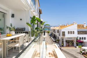 a view of a street from the balcony of a building at Puerto Banus Duplex Lux Selection in Marbella