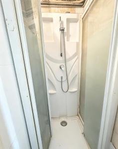 a shower in a bathroom with a shower stall at Private Room Pré-Saint-Gervais in Le Pré-Saint-Gervais