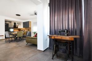 a living room with a sink and a fireplace at Luma 2 Luxury House on the Beach in Murter