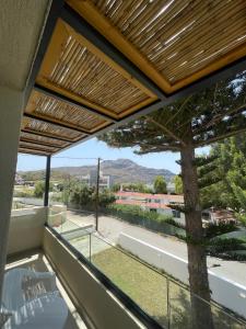 a view from the balcony of a house at Nikos Apartments & Studios in Plakias