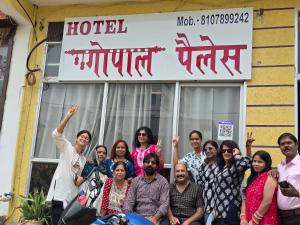 a group of people posing in front of a hotel at Hotel Gopal Palace in Khātu