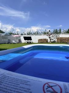 a close up of a blue swimming pool at Cabana GRAD in Săliştea de Sus