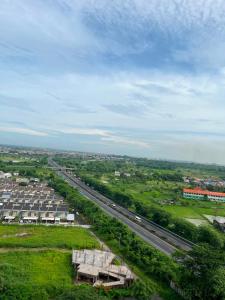 an overhead view of a highway with cars on it at Apartemen Gresik in Panggang